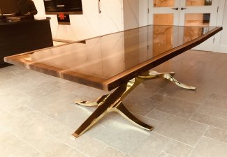 brass antler and walnut dining table